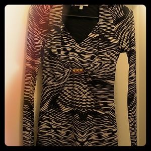 A ladies business casual knee length dress.